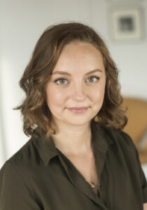 A woman with light brown hair.