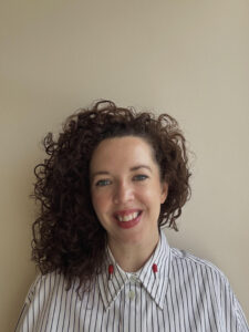 Headshot of Gemma Paynter smiling at the camera